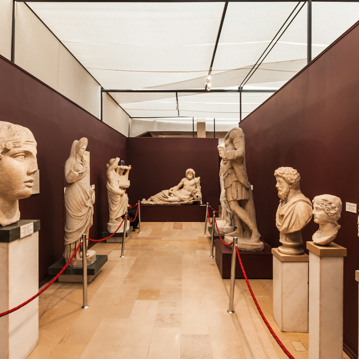 A museum filled with lots of statues and busts