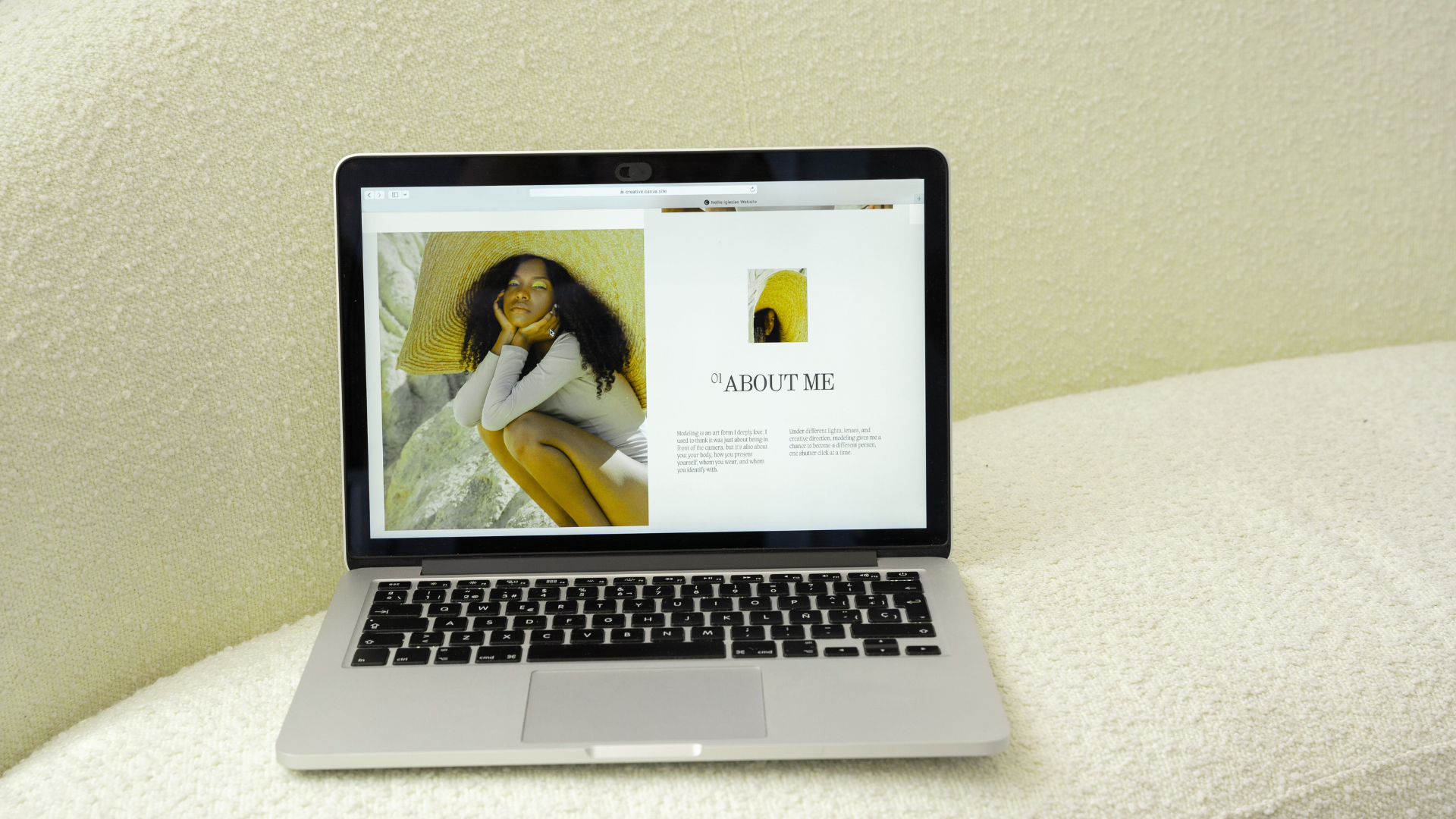 A laptop with a picture of a woman on the screen