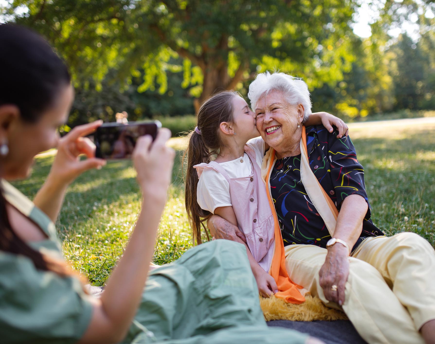 Happy Family Taking Picture — Port Charlotte, FL — Finly Family Insurance Agency