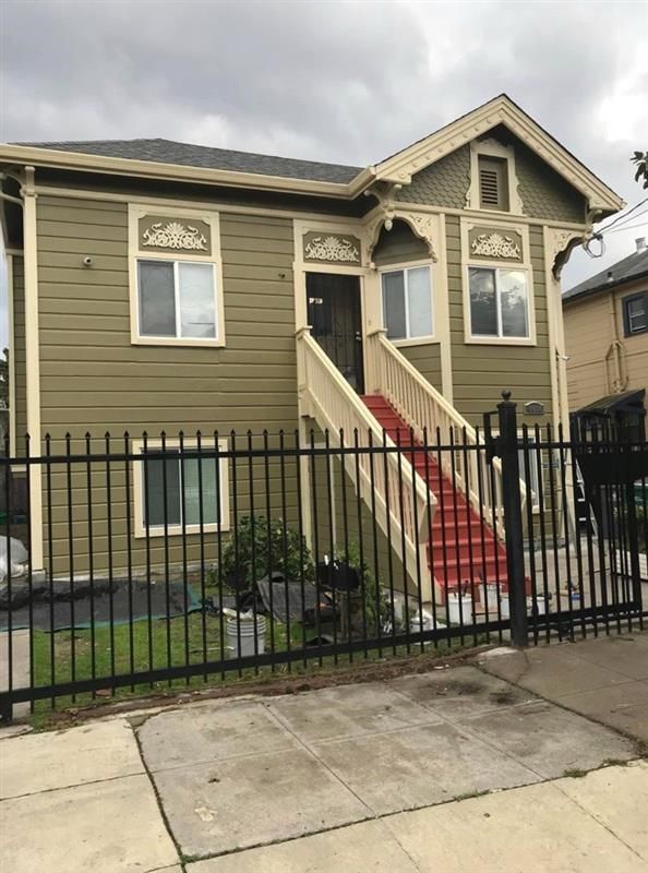 White shelving unit, sawhorse, and kitchen renovation in progress. White shelving unit, sawhorse, and kitchen renovation in progress.