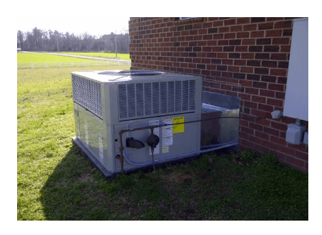 HVAC unit next to brick house — Polkton, NC — Austin's Mechanical Service, Inc