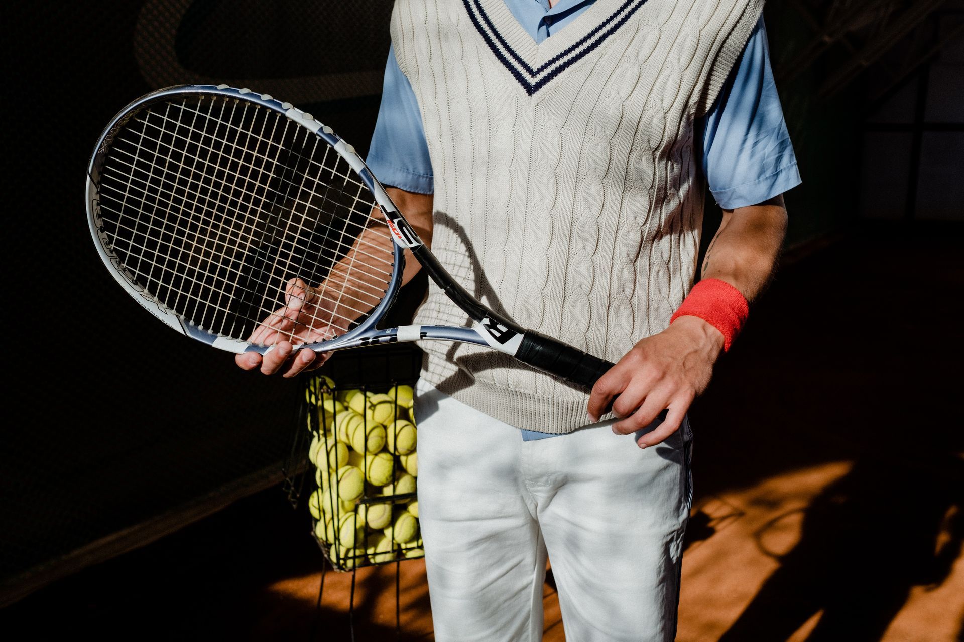Holding tennis racket