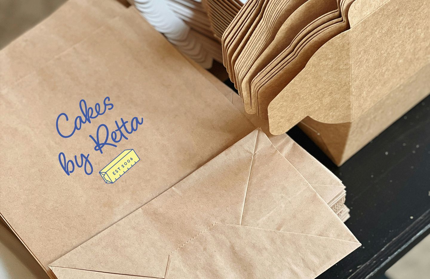 Brown paper bags, some stacked, with 