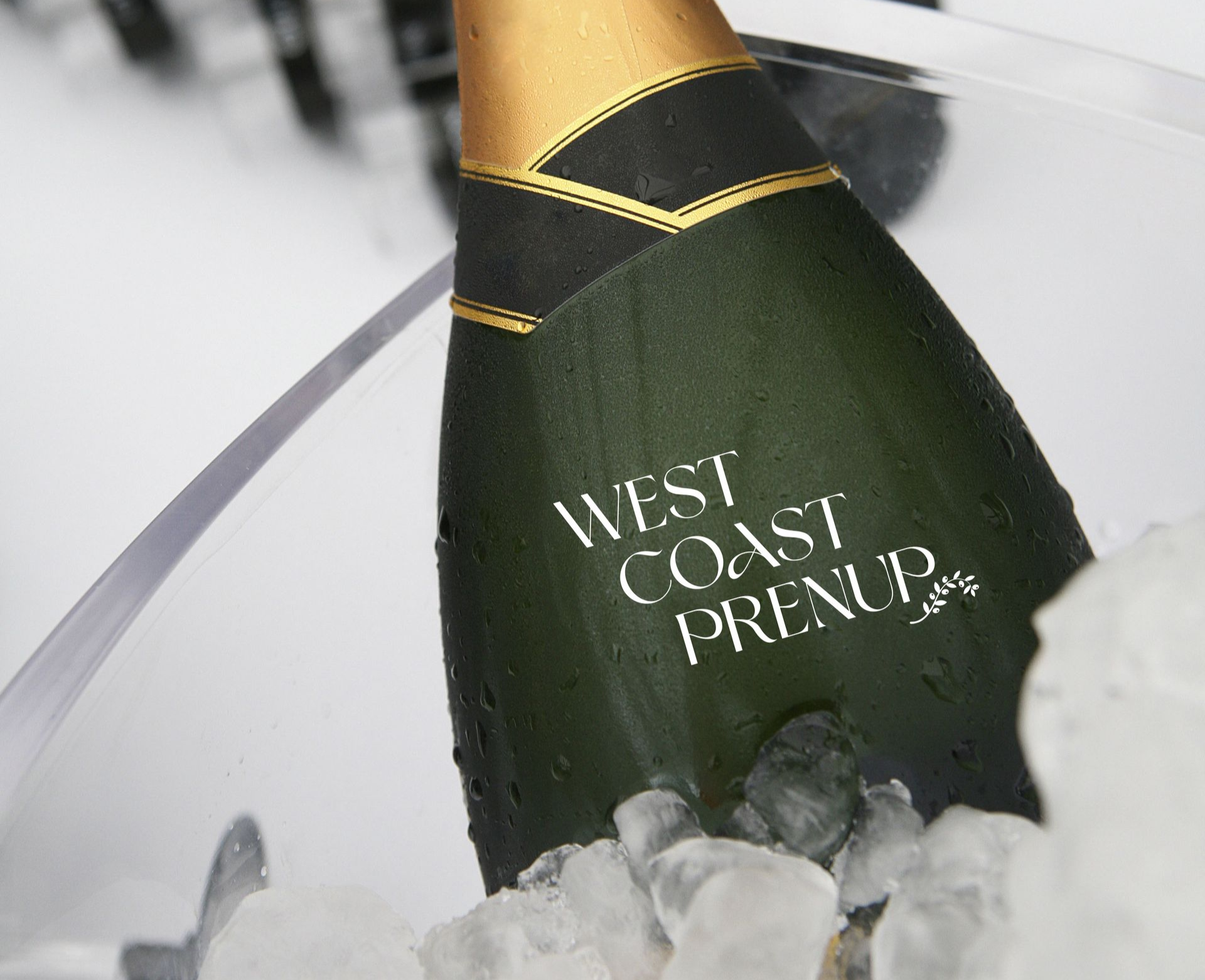 Green champagne bottle in an ice bucket with 