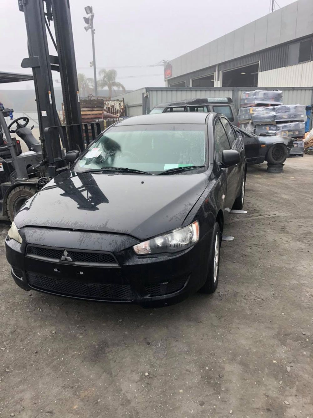 Used Car Outside the Garage