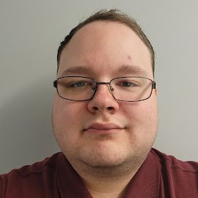 A black and white logo for a church with a cross on top of a mountain.