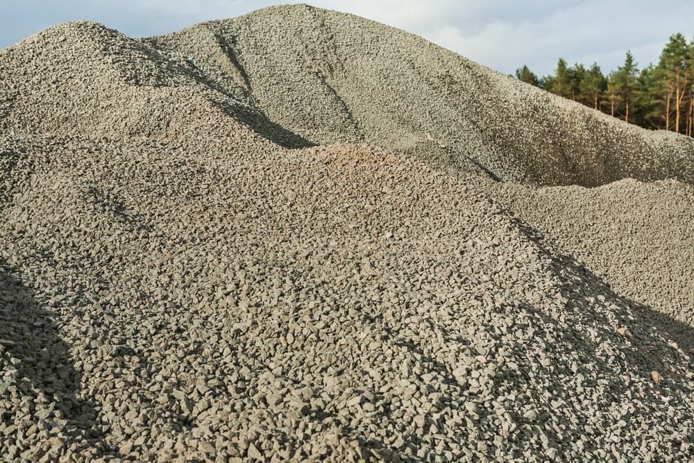 A Large Pile Of Gravel Is Sitting On Top Of A Hill  — Tenterfield Timber & Hardware in Tenterfield, NSW