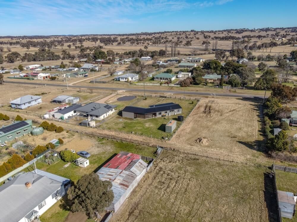 An aerial view of a small town with lots of houses and lots of grass — Tenterfield Timber & Hardware in Deepwater, NSW