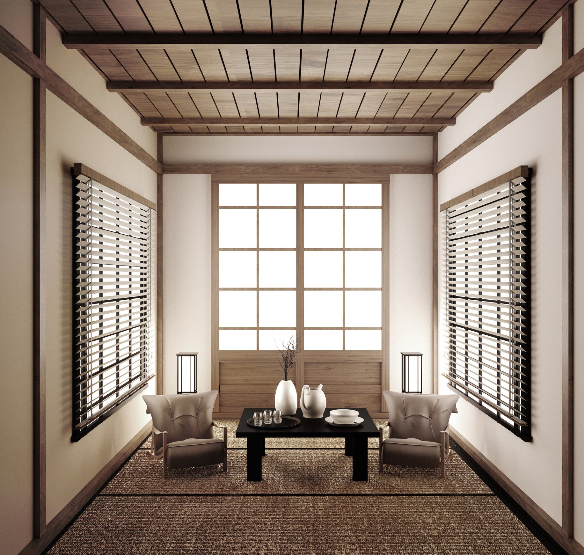 Japanese style lounge with timber shutters open on side walls, timber sliding doors at back, and tiber cieling. Two chairs site either side of a set coffee table.