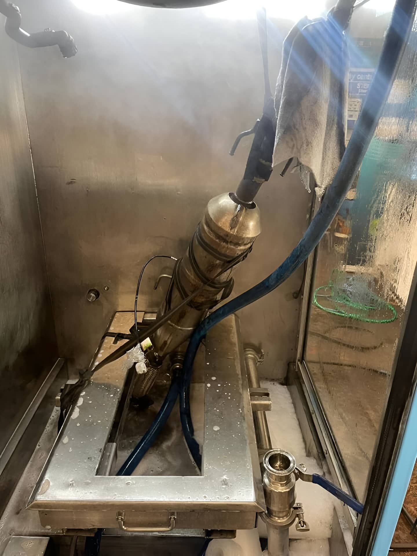 A Machine is Sitting Inside of a Stainless Steel Container — Regen NT In Holtze, NT