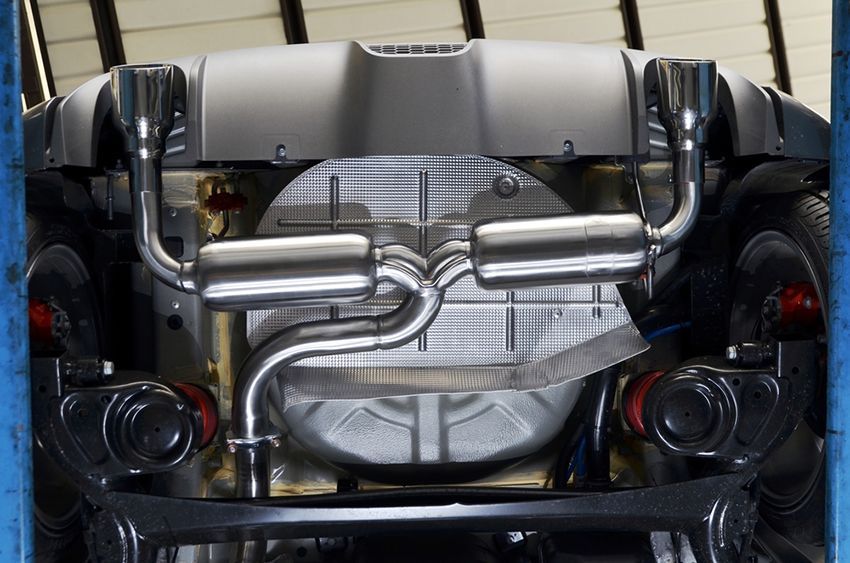 A Car on a Lift With the Exhaust Pipes Visible — Regen NT in Holtze, NT