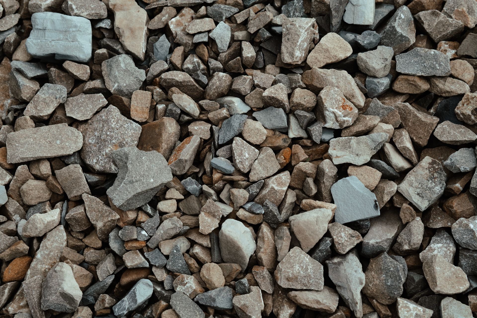 Crushed stone aggregate from a gravel driveway supplies store. Crushed stone aggregate from a gravel driveway supplies store.