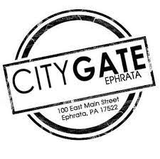 A black and white stamp with the words `` city gate ephrata '' written inside of it.