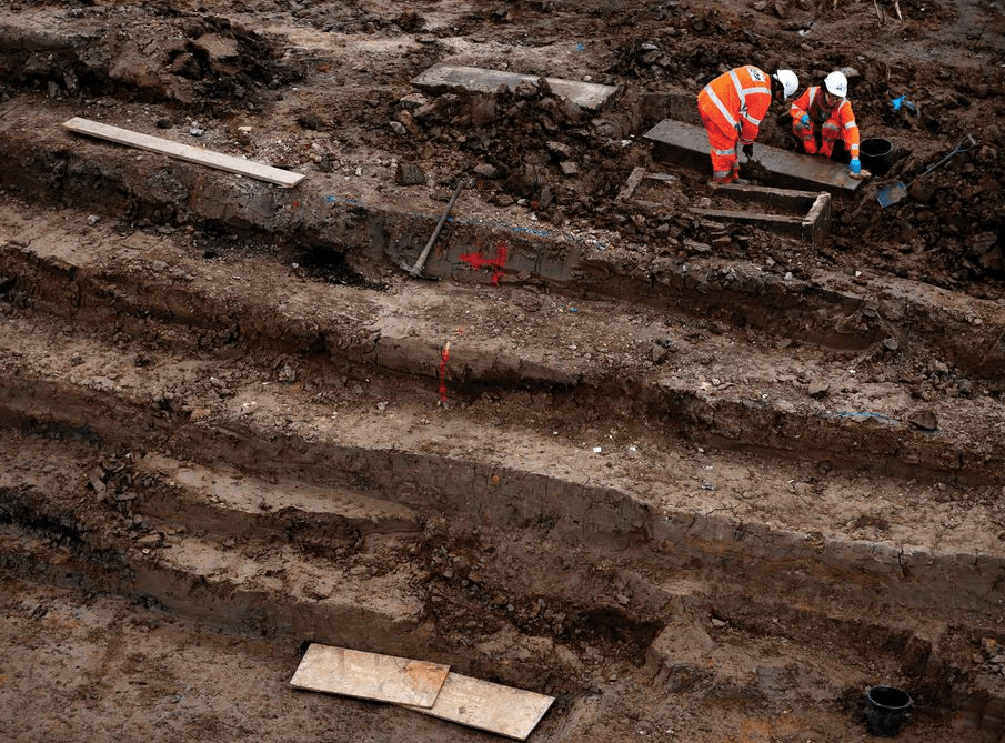 Archeologists discover artifacts on Addition Building & Design Construction work site.