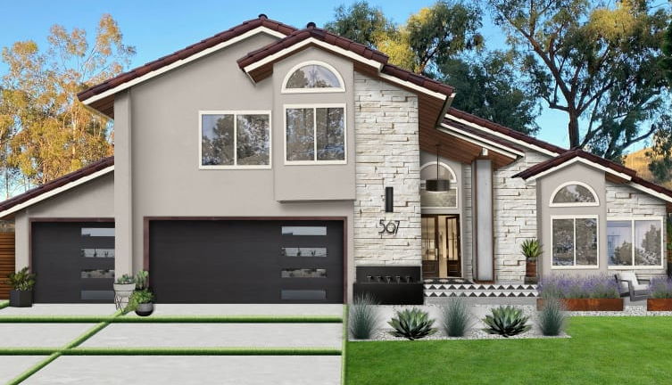 A white house with a white picket fence and a porch