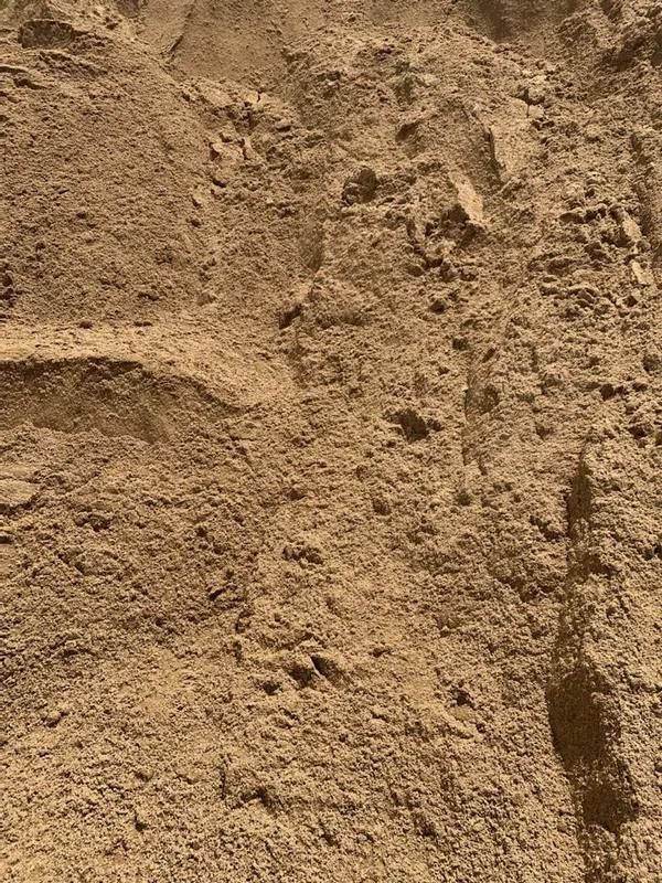 A Close up Of a Pile of Sand with Footprints in It — Nicks Readymix in Monkland, QLD