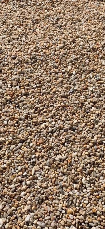 A Pile of Gravel Is Sitting on The Ground — Nicks Readymix in Monkland, QLD