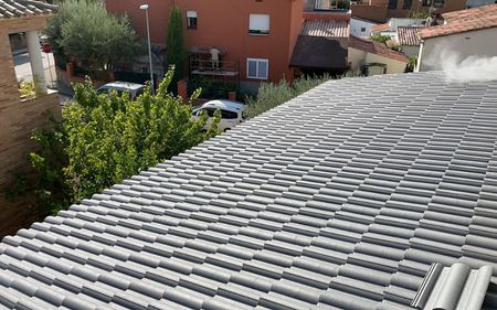 cambiar tejas en tejado de pizarra en chalet de Alcorcón, madrid