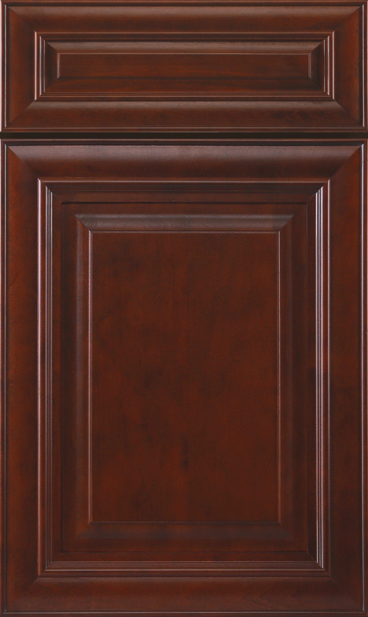 Dark brown wooden cabinet door with recessed panels and a decorative top drawer panel
