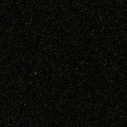 Dark, grainy black background with scattered white speckles like static or stars
