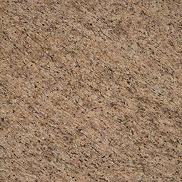 Close-up of a tan speckled stone or granite surface