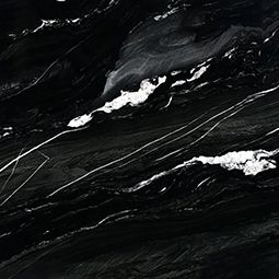 Dark black marble texture with white streaks and veins
