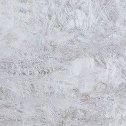 Close-up of soft white feathers with a fluffy, textured surface