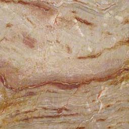 Close-up of beige and tan veined stone with layered, wavy patterns
