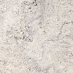 Light beige and gray speckled stone or granite surface texture