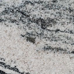 Close-up of speckled gray-and-white granite with dark veining