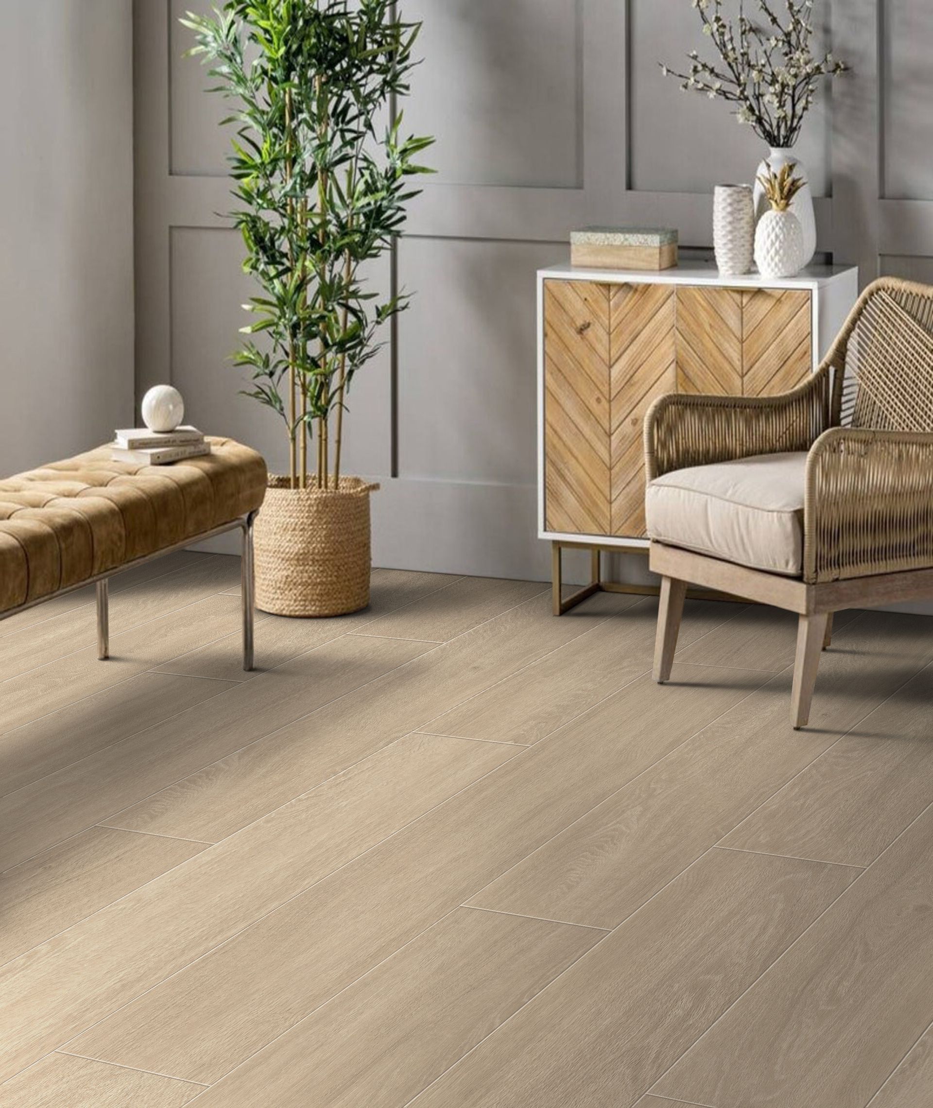 Modern open-plan living room with gray sofa, wooden chair, dining area, and large windows