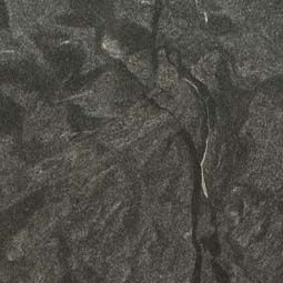 Close-up of dark gray, crinkled fabric texture with subtle wrinkles and folds