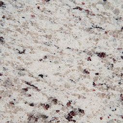 Speckled light beige granite countertop with black and burgundy flecks