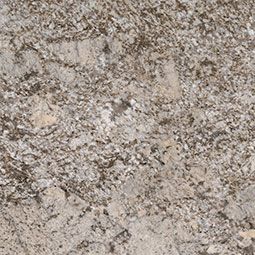 Close-up of speckled gray and beige stone or granite texture