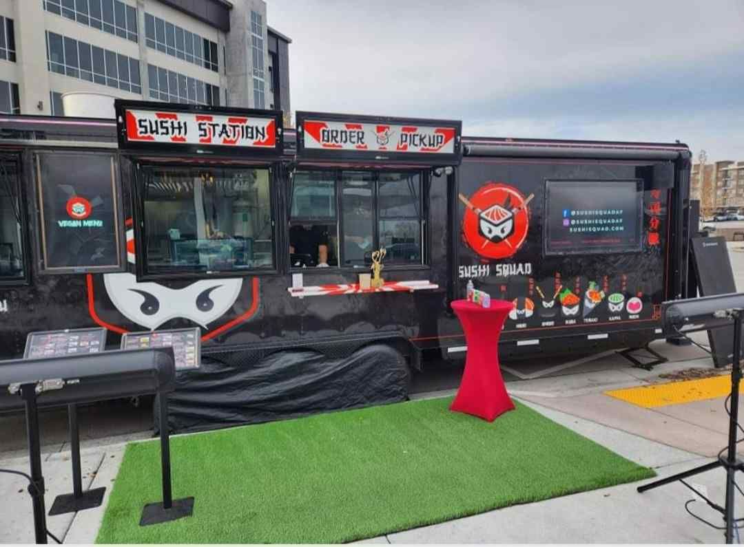 Sushi food truck getting ready to serve food.