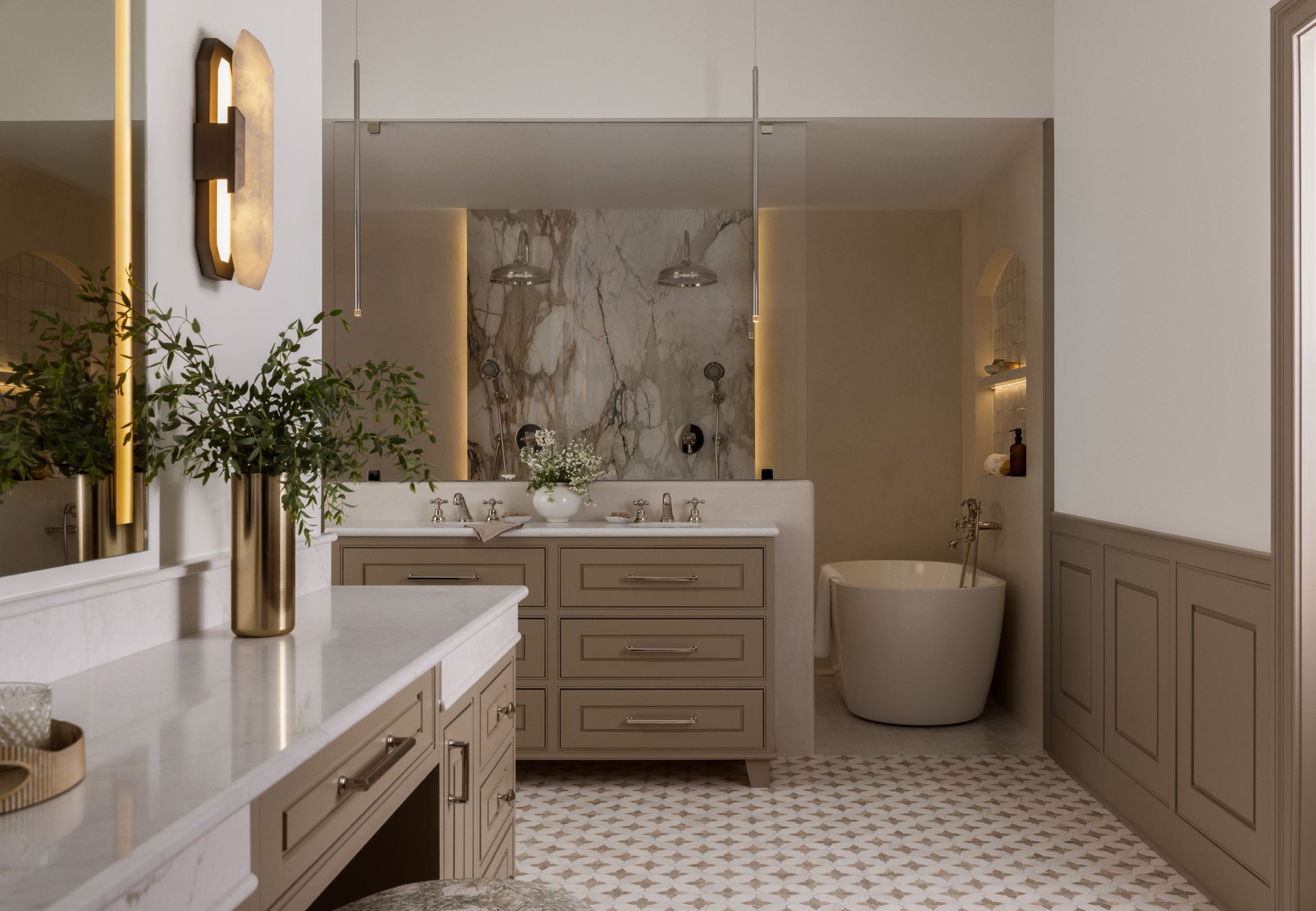 A bathroom with two sinks , a tub , and a mirror.
