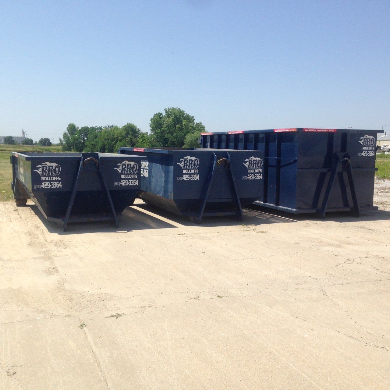 Yellow industrial garbage skip offered by Pro Rolloffs