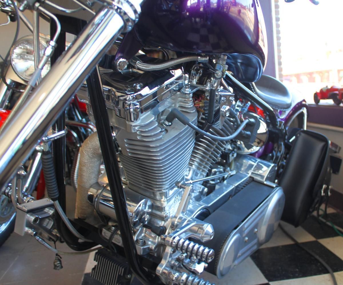 A close up of a purple motorcycle engine