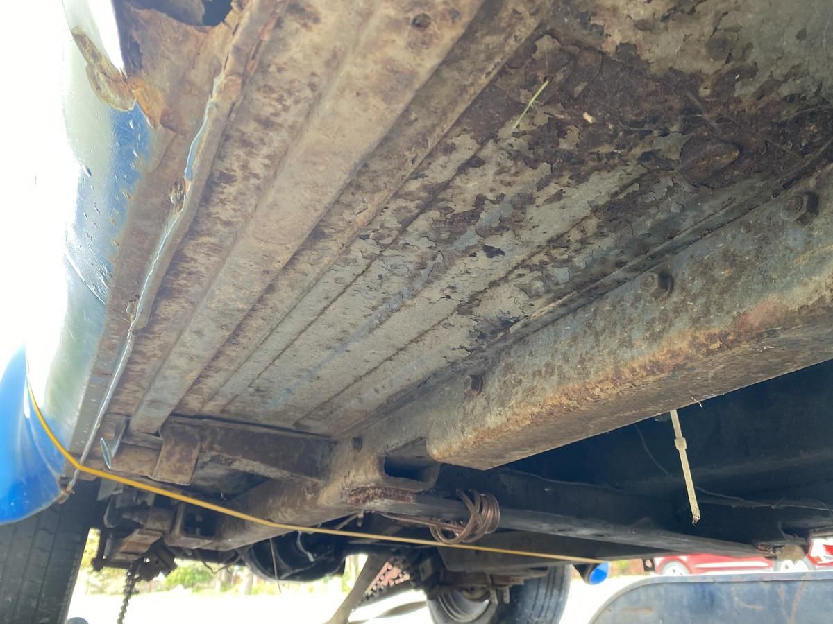 A close up of the underside of a car.