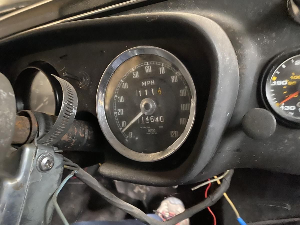 A close up of a speedometer that reads 15540