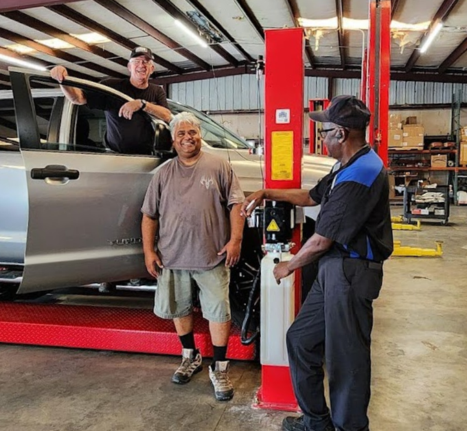 Our Certified Mechanics and Customer in Ocala Truck & Car Center - Ocala Auto Repair 