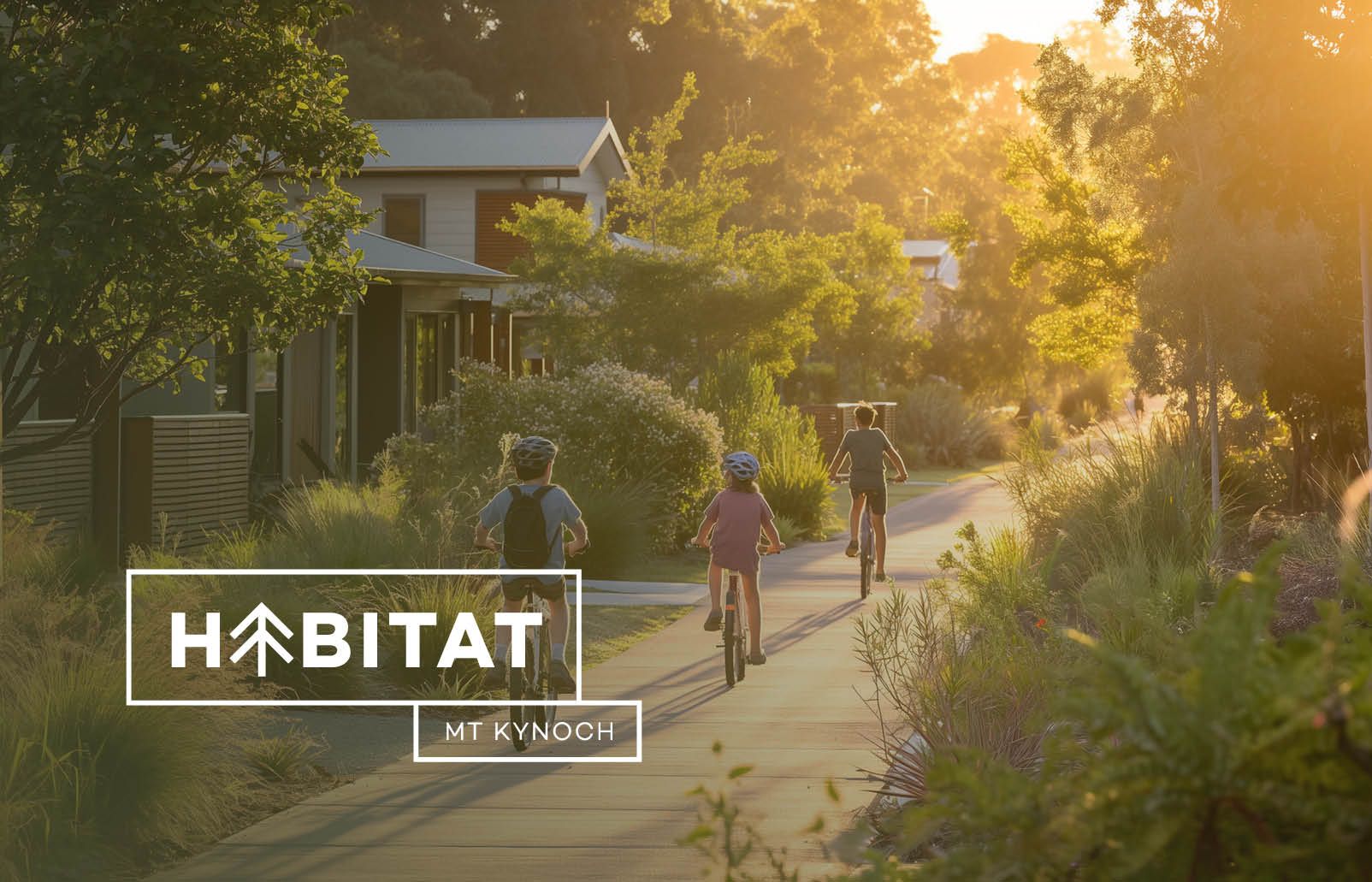 A group of people are riding bikes down a path.