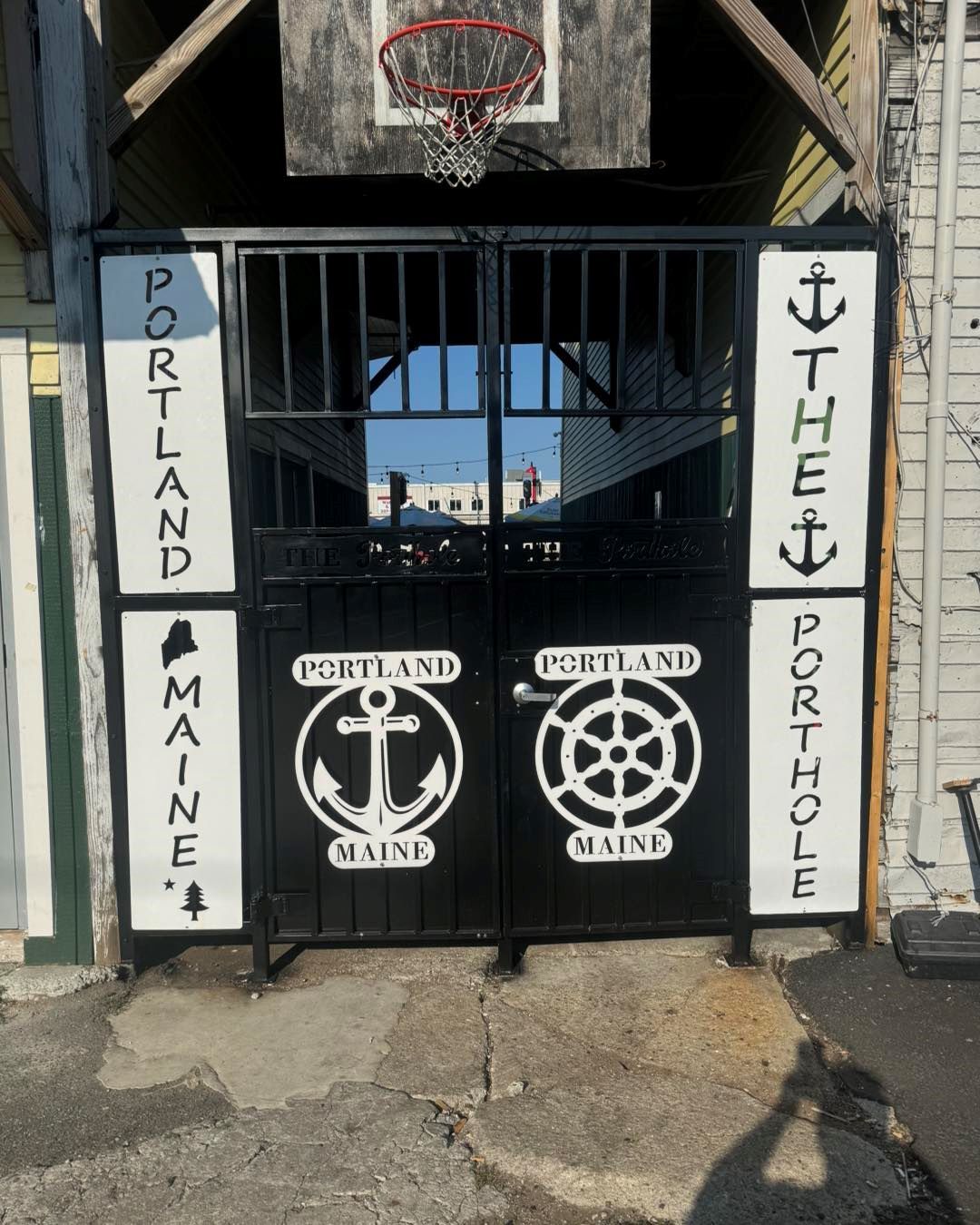 A gate that says portland maine on it