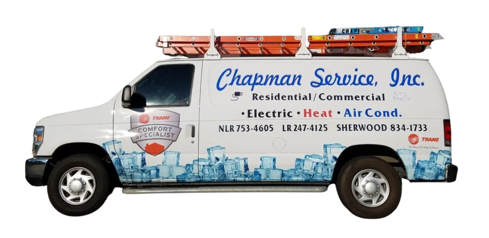 White Chapman Service, Inc. service van with ladders on top and blue/red lettering, side view