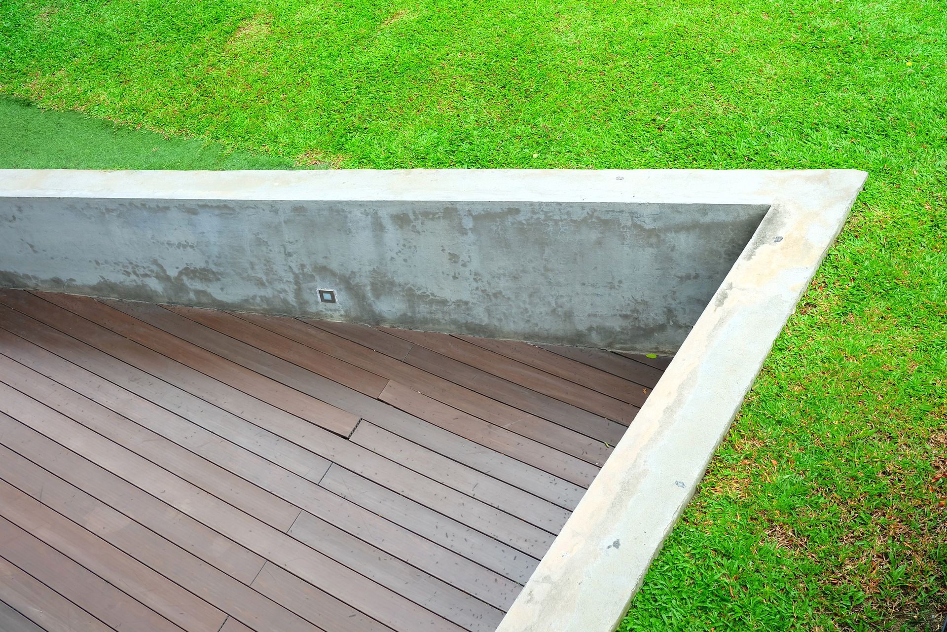 Wooden Deck Surrounded In Concrete Wall - Cherry Hill, NJ - Remodeling Revolution