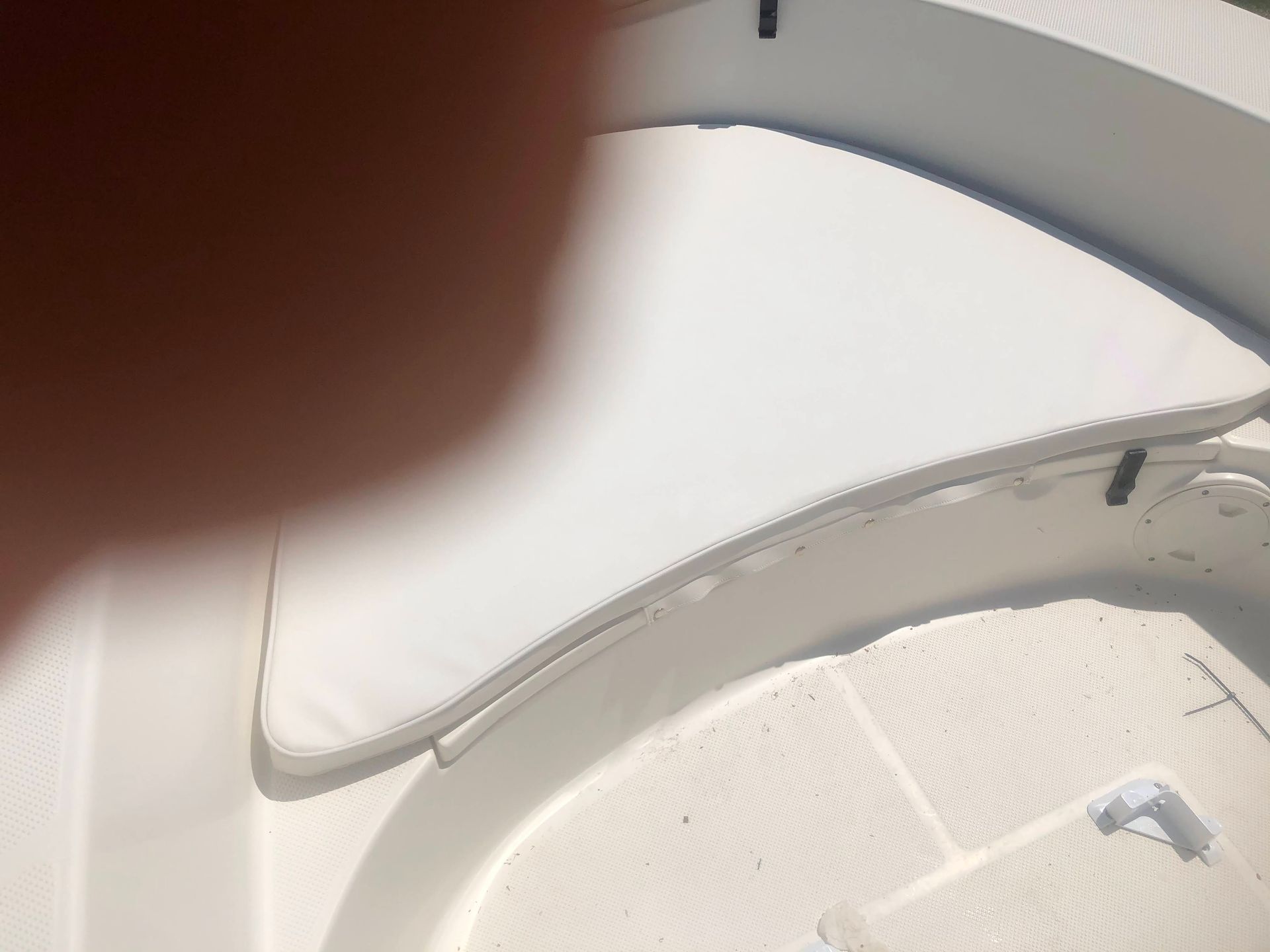 White boat cushions and flooring.