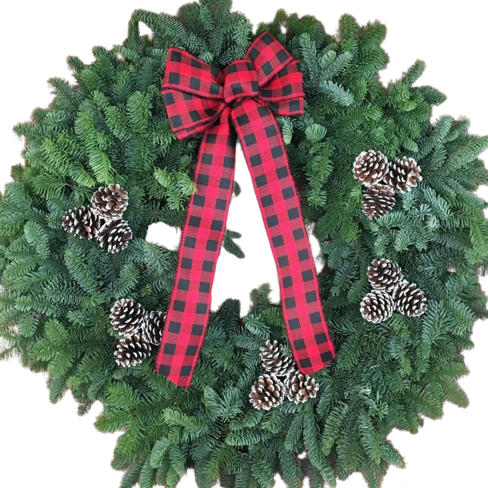 A christmas wreath with pine cones and a red and black checkered bow.