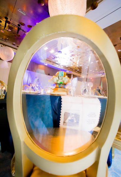 A chair with a mirror in the middle of it