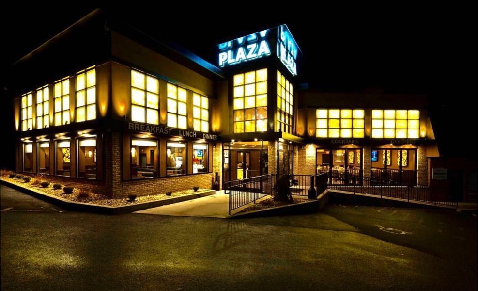 A large building with the word plaza on it