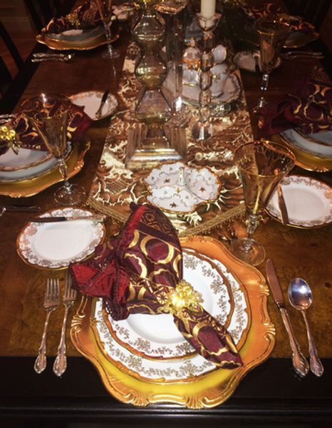 A table set for a dinner party with plates and silverware